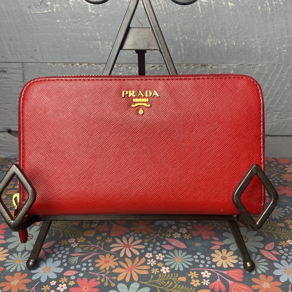 Prada red saffiano leather zip around wallet